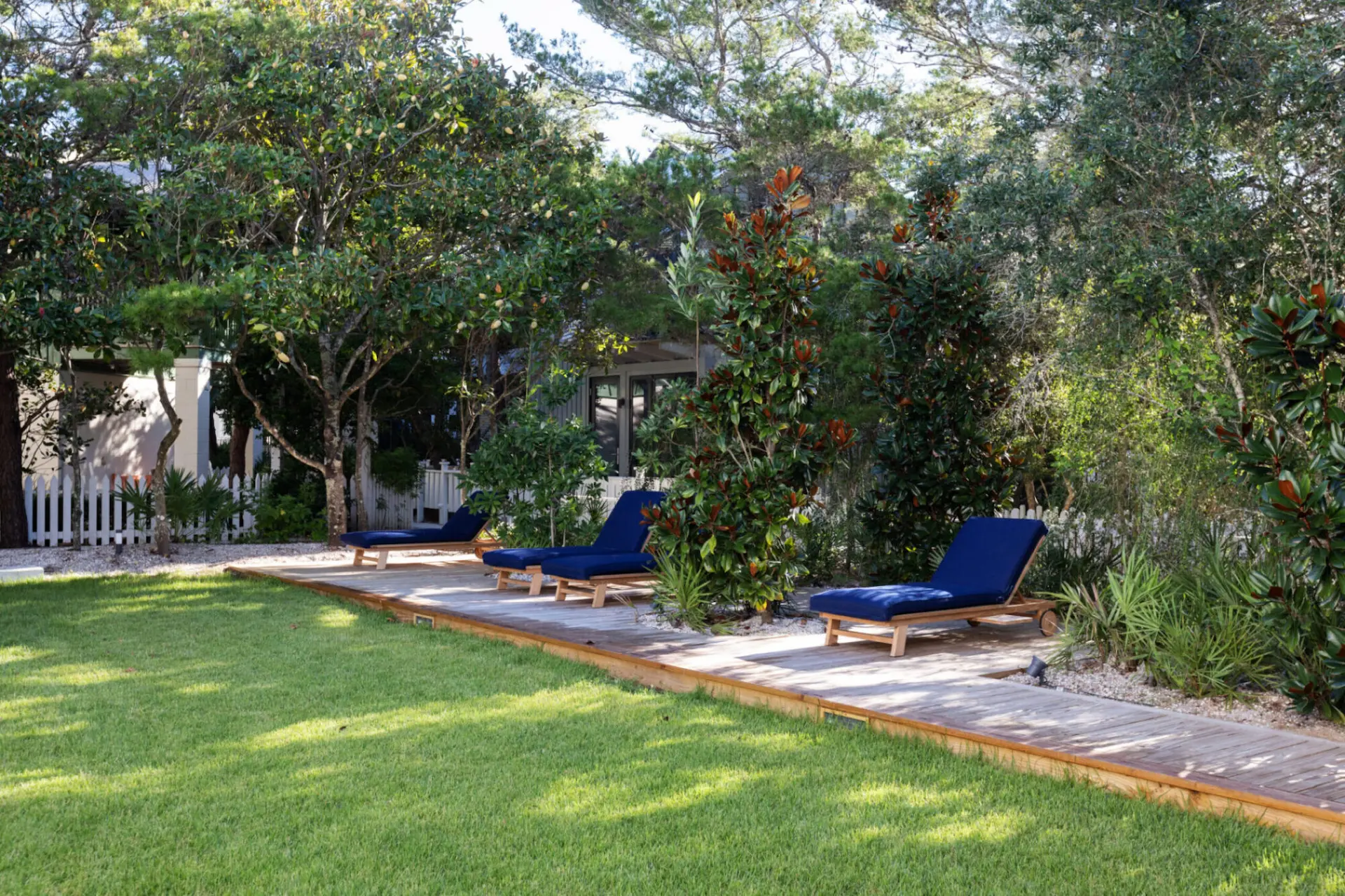 Picture of the lounge chairs in blue color in the garden
